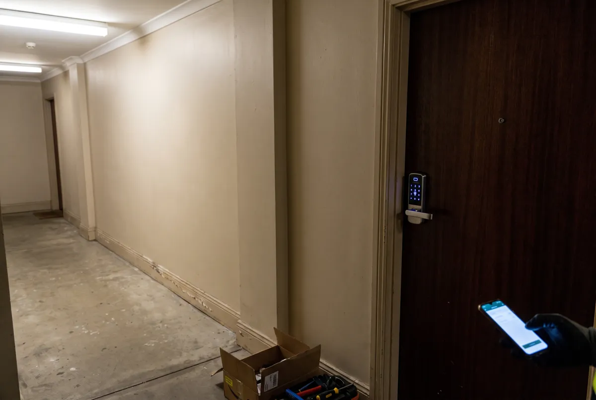 Keypad smart lock on an apartment entry door